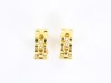 a pair of yellow gold earrings with diamonds on a white background