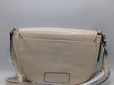 beige leather cross body bag with strap and shoulder strap