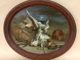 une photo d'un tableau représentant un oiseau et un oiseau posé sur une table
