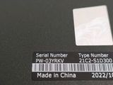 a label on the back of a laptop that says serial number