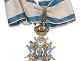 Gros plan sur une médaille entourée d'un ruban
