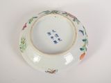 a white plate with a floral design on it