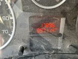 a close up of a speedometer on a motorcycle
