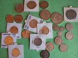 a lot of coins that are on the table