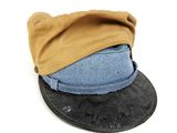 two hats that are stacked on top of each other