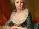 portrait of a lady in a blue dress with a book in her lap