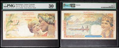 three different types of bank notes on display in a display case