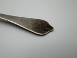 a spoon that is sitting on a table