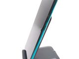 a cell phone that is sitting on a stand