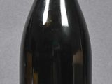 a bottle of wine that is sitting on a table