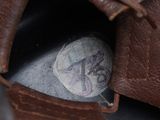 a baseball glove with a ball inside of it