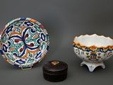 three different types of decorative items on a gray surface