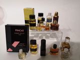 a display of perfumes and perfume bottles on a table