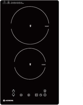 gros plan d'une cuisinière noire à deux brûleurs