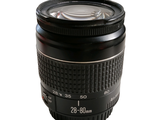 a camera lens that is sitting on a white surface