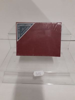 a red card holder with a flag on it