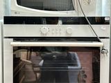 a microwave and a microwave oven in a kitchen