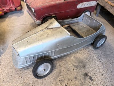 a toy car that is sitting in the garage