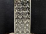 a glass vase that has a lot of bubbles in it