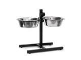 two stainless steel bowls on a black stand