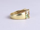 an image of a close up of a ring on a white surface