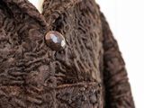 a close up of a coat on a mannequin mannequin