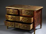 a small chest of drawers with a drawer underneath it