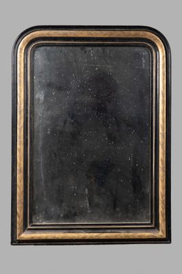 an image of a black and gold framed mirror