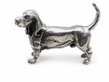 a close up of a dog figurine on a white background