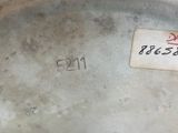 a close up of a silver plate with a label on it