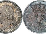 a close up of a coin with a crown on top of it