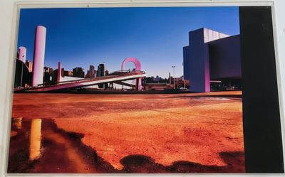 photo encadrée représentant une vue de ville avec une grande roue au loin