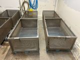 two bins that are sitting on the floor next to each other
