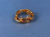 gold ring on a blue background