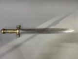 a knife that is laying on a table