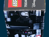 a box that has a lego star wars light saber in it