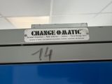 a sign that says change - o - matic on the back of a bus