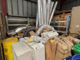 boxes and hoses are stacked on top of each other in a warehouse