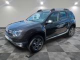 a picture of a black dacia parked in a garage