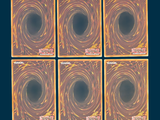 four square coasters with orange and yellow swirl designs on them
