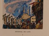 a picture of a book with a picture of a town