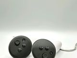 two remote controls that are connected to each other