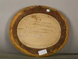 a picture of a wooden plate with writing on it