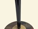 an image of a black and gold table with a wooden base