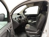 the interior of a car with the door open and the driver ' s seat down
