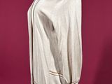 an image of a mannequin dress on a mannequin stand