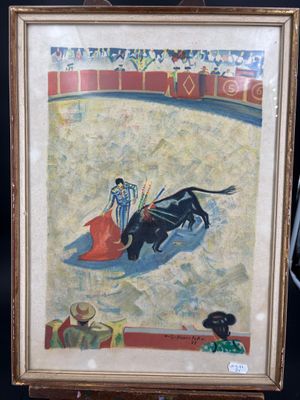 tableau encadré représentant une scène de corrida avec un taureau et un torero