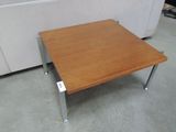 a coffee table that is on the floor in a room