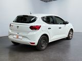 the rear end of a white car parked in a garage
