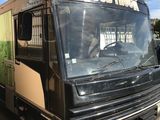 an image of a bus parked in a parking lot
